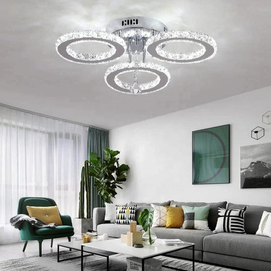 Luxurious Illumination: Stainless Steel LED Chandeliers - Crystal Adorned Rings for a Modern Living Room