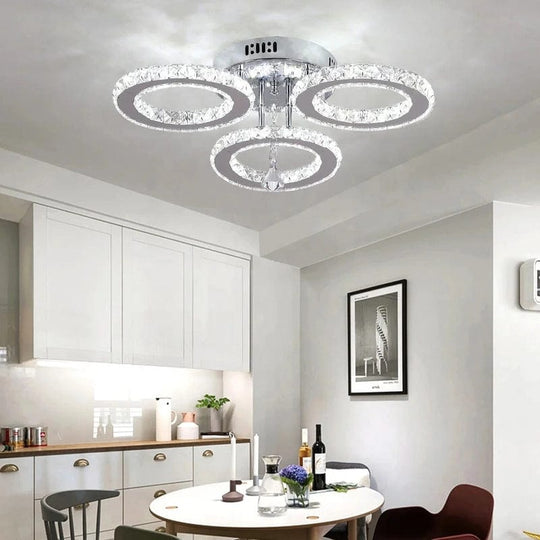 Luxurious Illumination: Stainless Steel LED Chandeliers - Crystal Adorned Rings for a Modern Living Room