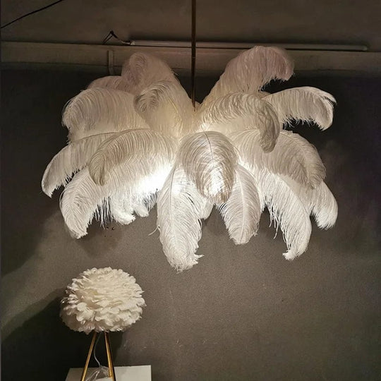 Feathered Elegance: Transform Your Space with a Nordic Luxury LED Chandelier - Modern White Ostrich Feather Pendant Lamp for Stylish Home Decor.