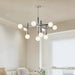 Minimalist Elegance: Nordic Iron Glass Ball Pendant Lamp - Chrome Atomic Chandelier for Stylish Living Room Hanging Lights