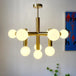 Minimalist Elegance: Nordic Iron Glass Ball Pendant Lamp - Chrome Atomic Chandelier for Stylish Living Room Hanging Lights