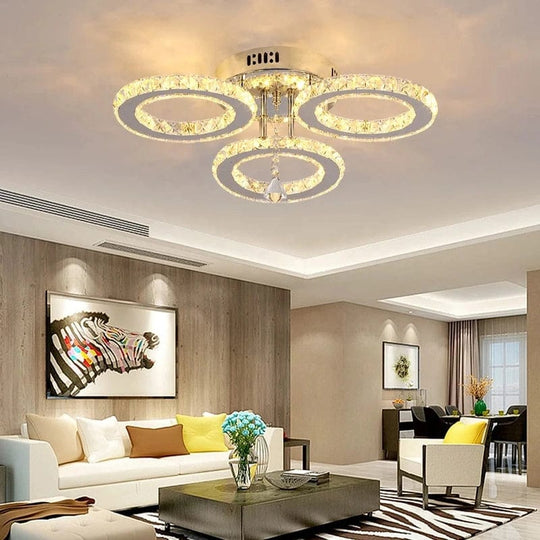 Luxurious Illumination: Stainless Steel LED Chandeliers - Crystal Adorned Rings for a Modern Living Room