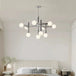 Minimalist Elegance: Nordic Iron Glass Ball Pendant Lamp - Chrome Atomic Chandelier for Stylish Living Room Hanging Lights